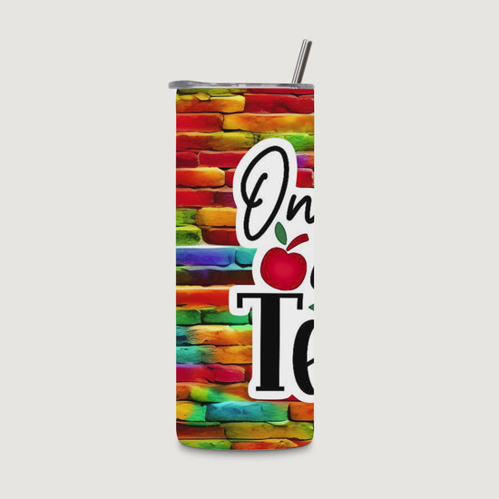 20oz water bottle rotating video showing the "Only The Brave Teach" design on a rainbow brick background.